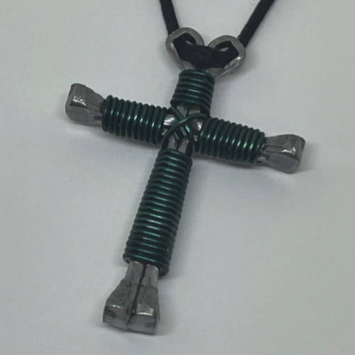 Nail cross necklace wrapped with bold teal wire.