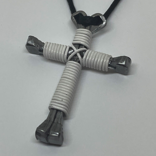 Nail cross necklace wrapped with bold ultra wire.