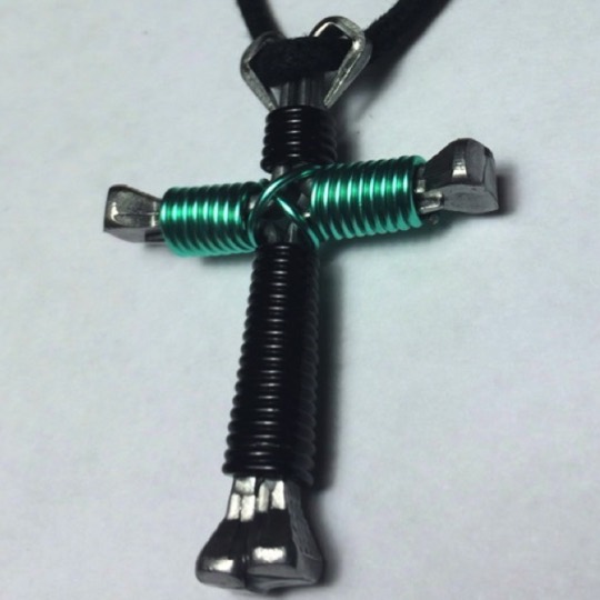 Black seafoam nail crosses Black seafoam nail crosses