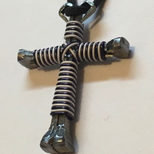 Horseshoe nail cross made with black and white wires horseshoe nail cross black white