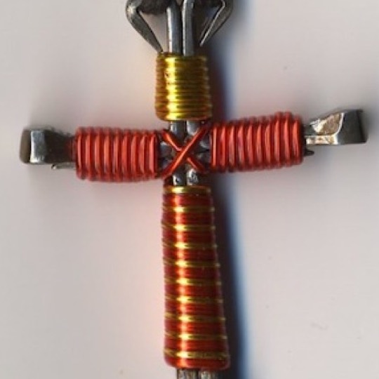 orange yellow nail cross necklace