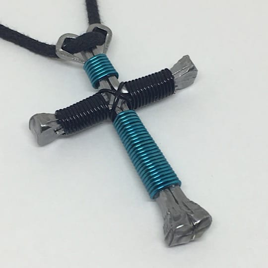 customized zipper pulls made with horseshoe nails and wire